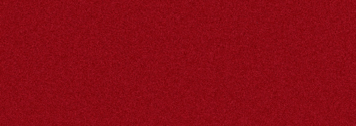 Solid red textured emblem with visible grain, serving as a small centered logo mark